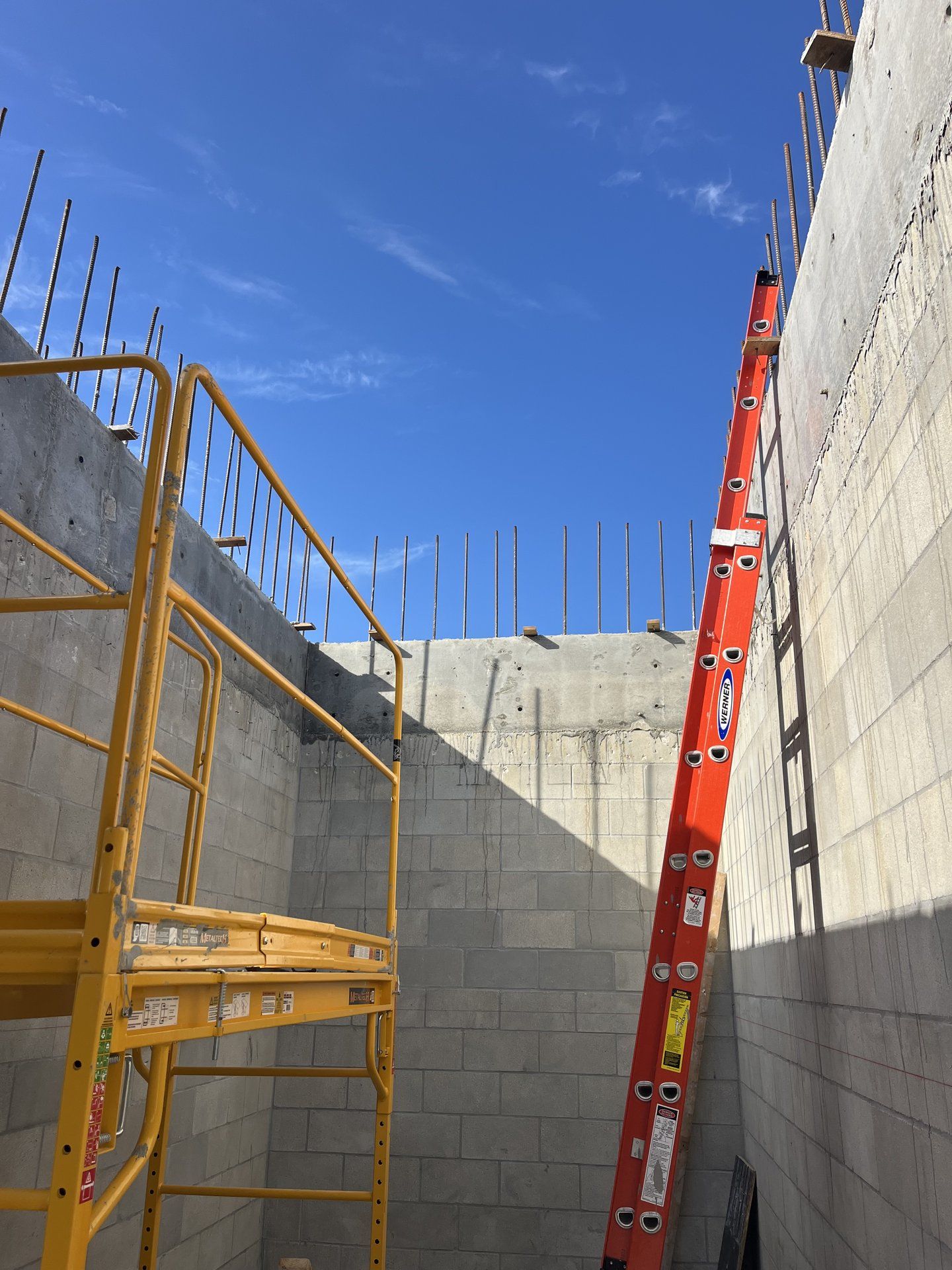 Concrete cantilever and rebar detail on a custom-home shell